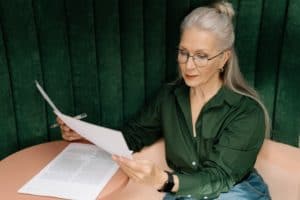 Female Senior doing paperwork