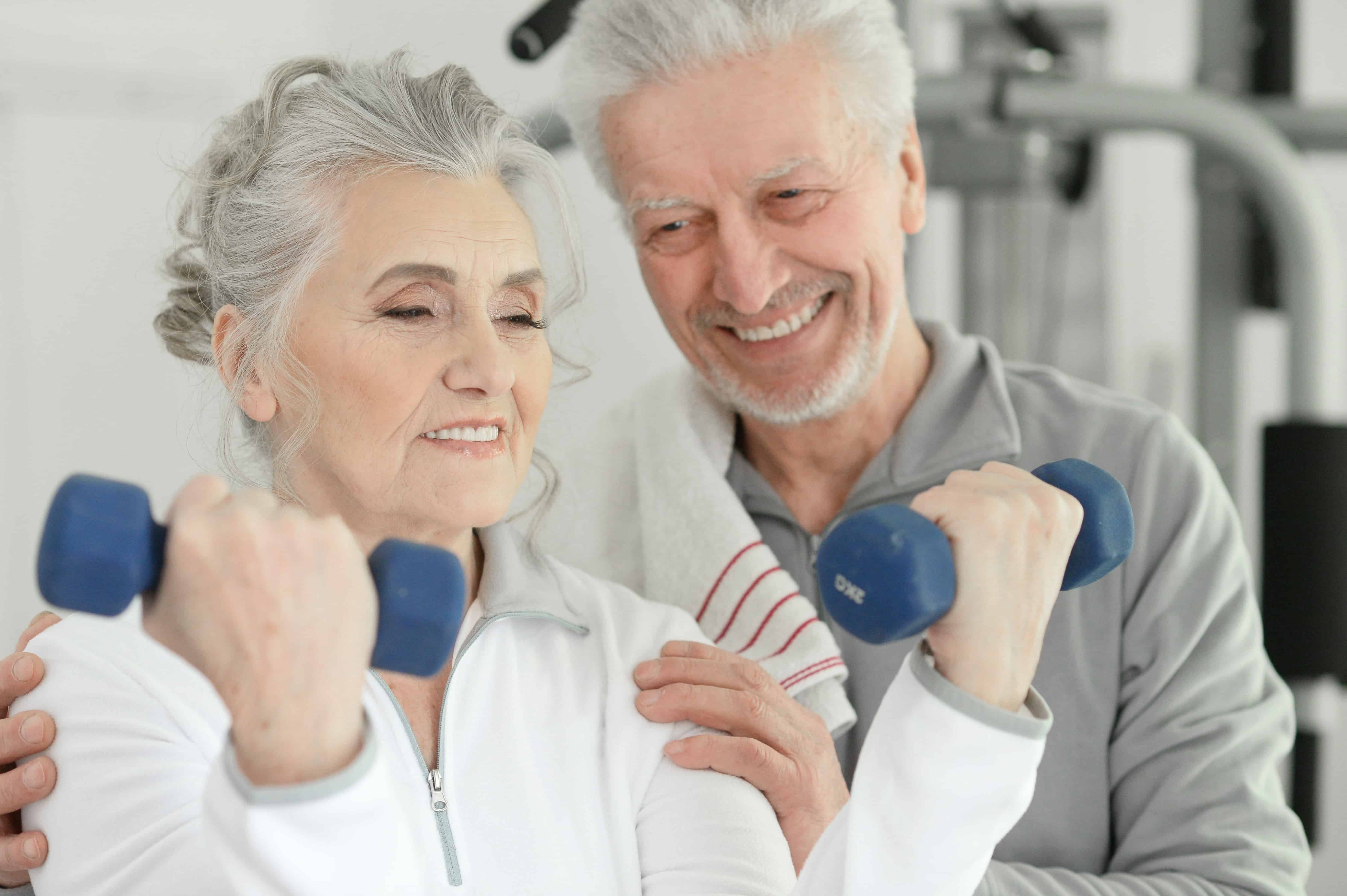 Senior woman lifting weights