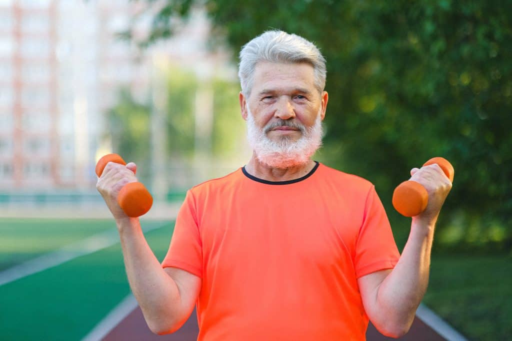 Senior Male using free weights